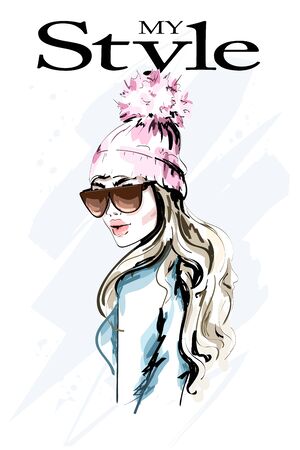 Hand drawn fashion woman in knitted hat with fur pompom. Stylish beautiful young woman portrait. Cute girl in winter clothes. Sketch.のイラスト素材