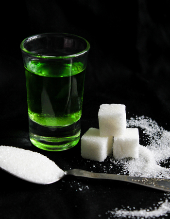 absinthe with sugar cubesの写真素材