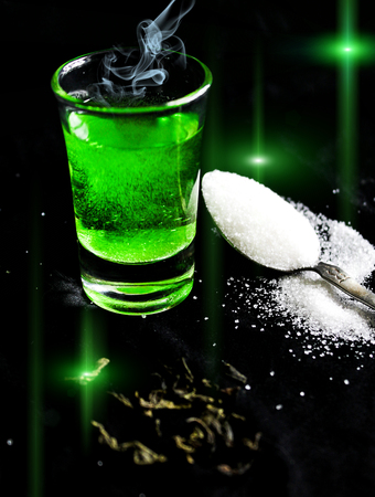absinthe with sugar cubesの写真素材