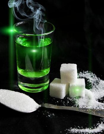 absinthe with sugar cubesの写真素材