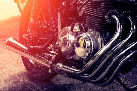 Part of the motorcycle. Close up. Soft lighting effect, vintage