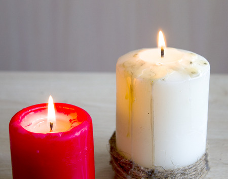 burning candles in the dark image can be used on various themed holidaysの写真素材