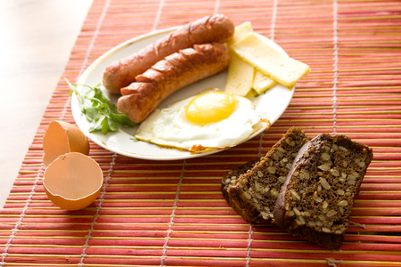 Very tasty rustic kitchen, fresh rural eggs with milk and breadの写真素材