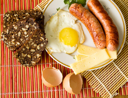Very tasty rustic kitchen, fresh rural eggs with milk and breadの写真素材