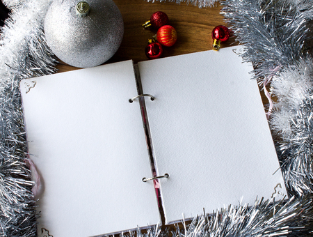 White notepad. Happy new year.New Year's goals with colorful decorations.の写真素材