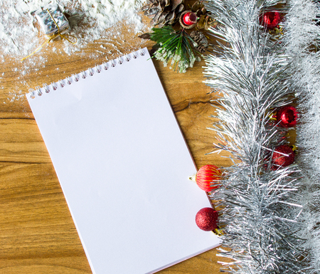 White notepad. Happy new year.New Year's goals with colorful decorations. Soft, gentle lighting effects.の写真素材
