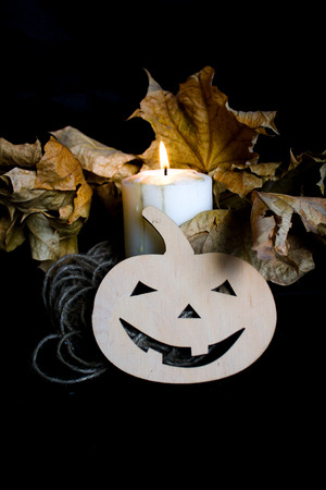 Halloween with candles and pumpkins from a tree.の写真素材