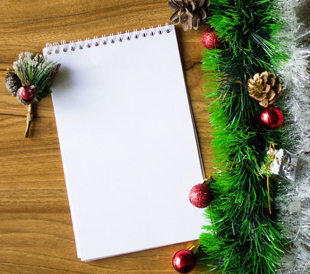 White notepad. Happy new year.New Year's goals with colorful decorations. Soft, gentle lighting effects.の写真素材