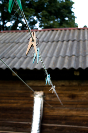 clothespins, clothespins hanging on the ropes.の写真素材