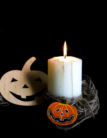 Halloween with candles and pumpkins from a tree.の写真素材