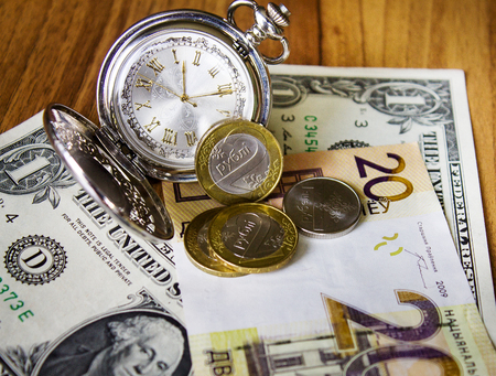 pocket watch, dollar Belarusian money Background, new money in Belarus. Denomination in Republic of Belarus 2016.の写真素材