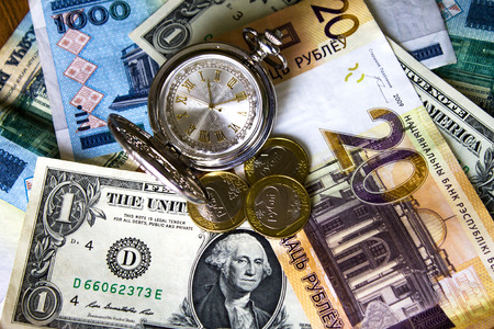 pocket watch, dollar Belarusian money Background, new money in Belarus. Denomination in Republic of Belarus 2016.の写真素材