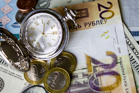 pocket watch, dollar Belarusian money Background, new money in Belarus. Denomination in Republic of Belarus 2016.の写真素材