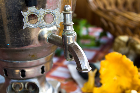 Samovar on a table.Samovar crane.Chayapitiye, taste, nostalgia on old.の写真素材