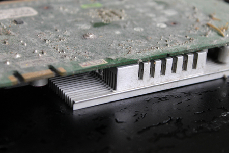 chip, computer graphics in the dust on the black background, for design, close-upの写真素材