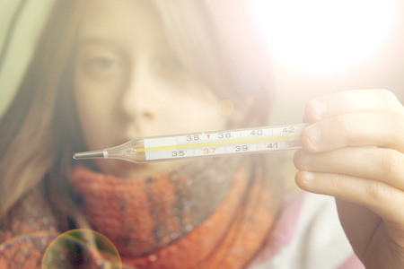 small child falls ill, treatment and prevention, soft light effectの写真素材