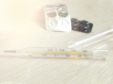 thermometer and other medications for the treatment of patientsの写真素材