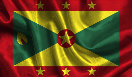 Realistic flag of Grenada on the wavy surface of fabric.の写真素材