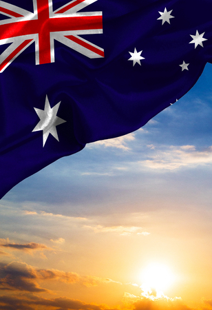 Grunge colorful flag Australia, with copyspace for your text or images against the background of the sunset skyの写真素材