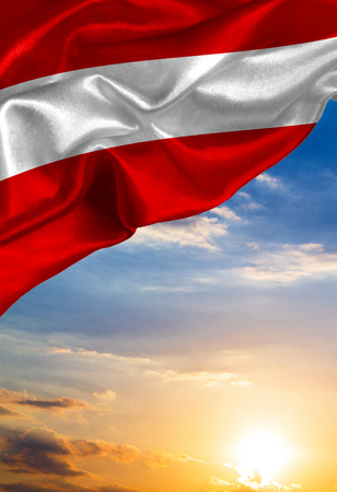 Grunge colorful flag Austria, with copyspace for your text or images against the background of the sunset skyの写真素材