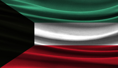Realistic flag of Kuwait on the wavy surface of fabric. This flag can be used in designの写真素材