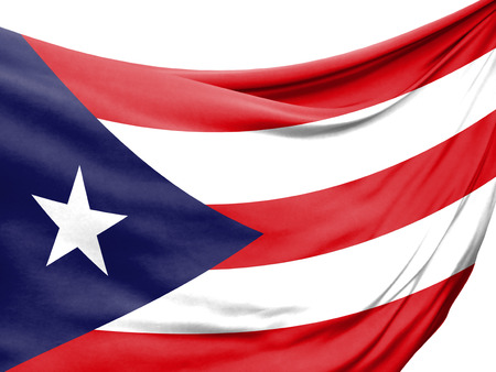 Closeup of rippled flag of Puerto Rico on white background.の写真素材