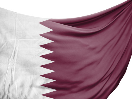 Closeup of rippled flag of Qatar on white background.の写真素材