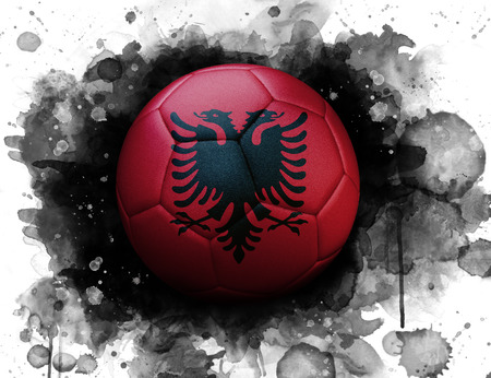 Soccer ball with flag of Albania, close up, watercolor effect on white background.の写真素材