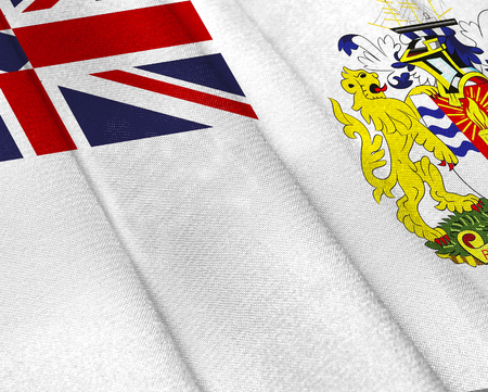 Realistic flag of British Antarctic Territory on the wavy surface of fabric. This flag can be used in designの写真素材