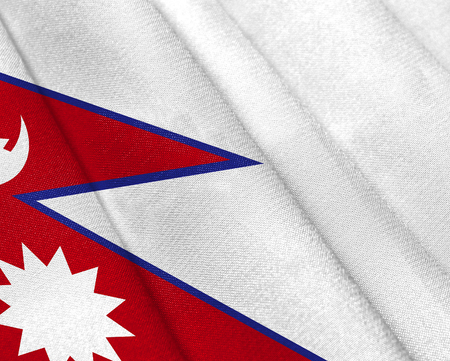 Realistic flag of Nepal on the wavy surface of fabric. This flag can be used in designの写真素材