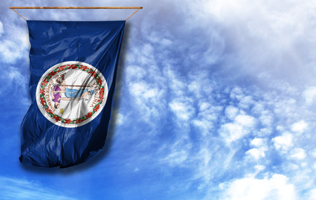 Flag State of Virginia. Vertical flag, against blue sky with place for your text