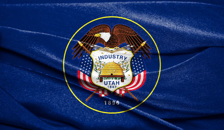 Realistic flag of State of Utah on the wavy surface of fabric. Perfect for background or texture...