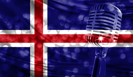 Microphone on a background of a blurry Iceland flag close-upの写真素材