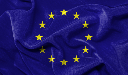 Realistic flag of European Union on the wavy surface of fabricの写真素材