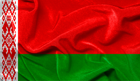 Realistic flag of Belarus on the wavy surface of fabricの写真素材