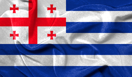 Realistic flag of Adjara on the wavy surface of fabric