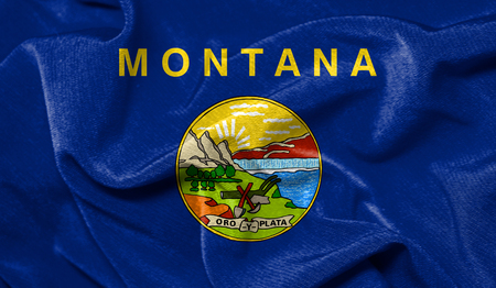 Realistic flag State of Montana on the wavy surface of fabricの写真素材