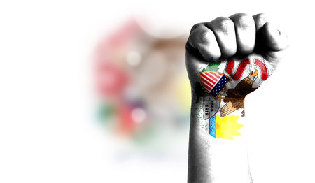 Flag State of Illinois painted on male fist, strength,power,concept of conflict. On a blurred background with a good place for your text.の写真素材