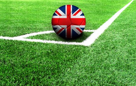 soccer ball on a green field, flag of United Kingdomの写真素材