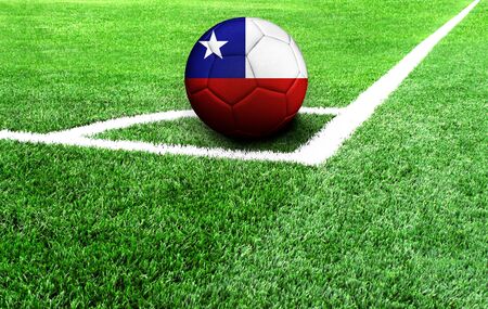 soccer ball on a green field, flag of Chileの写真素材