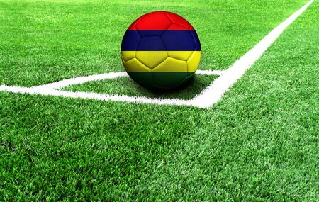 soccer ball on a green field, flag of Mauritiusの写真素材