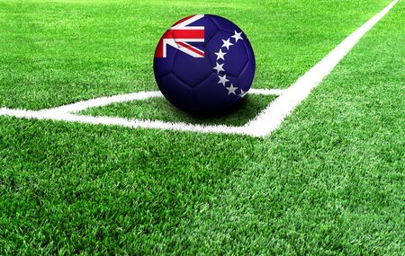 soccer ball on a green field, flag of Cook Islandsの写真素材