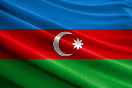 Realistic flag of Azerbaijan on the wavy surface of fabricの写真素材