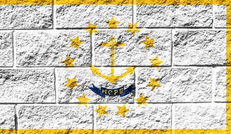 Flag State of Rhode Island and Providence Plantations close up painted on a cracked wallの写真素材