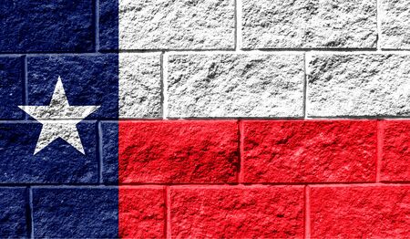 Flag State of Texas close up painted on a cracked wallの写真素材