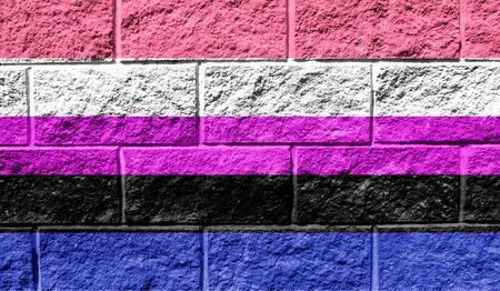 Flag of genderfluid close up painted on a cracked wallの写真素材