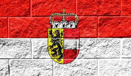 Flag of Salzburg close up painted on a cracked wallの写真素材