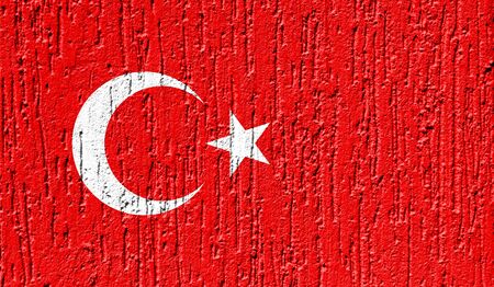 Flag of Turkey close up painted on a cracked wallの写真素材