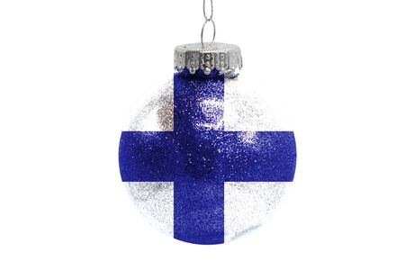 Glass Christmas ball toy isolated on white background with the flag of Finlandの写真素材