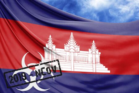 Novel coronavirus disease named 2019-nCoV with Cambodia flag closeup on blue sky backgroundの写真素材